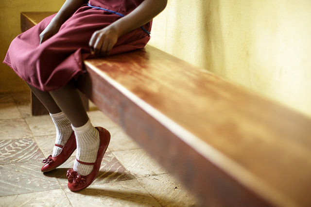 Girl sitting on a bench