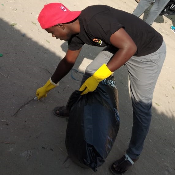 Man picking litter