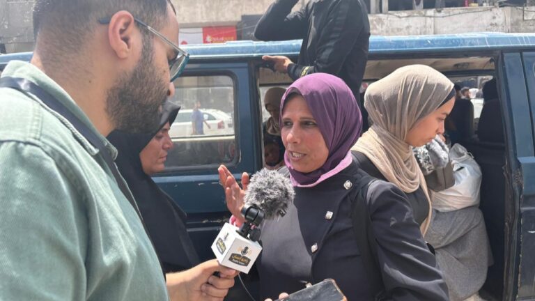 Man and woman talk about Gaza transportation